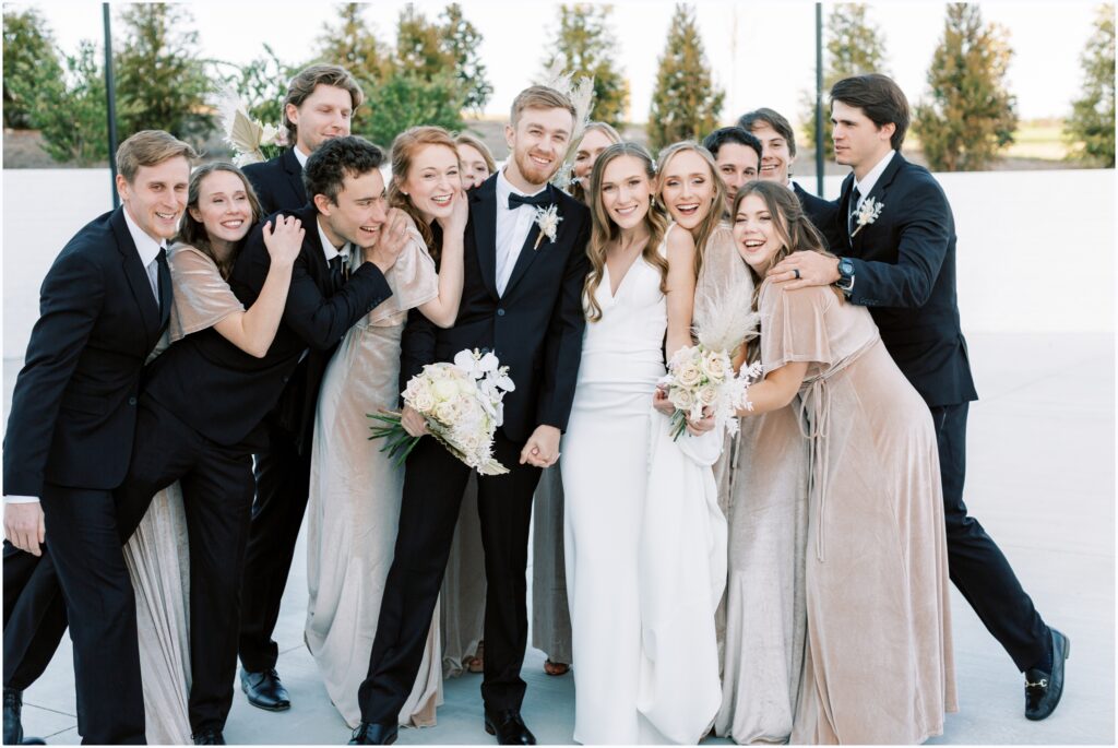 Wedding bridal party group shot at the wedding venue after the reception